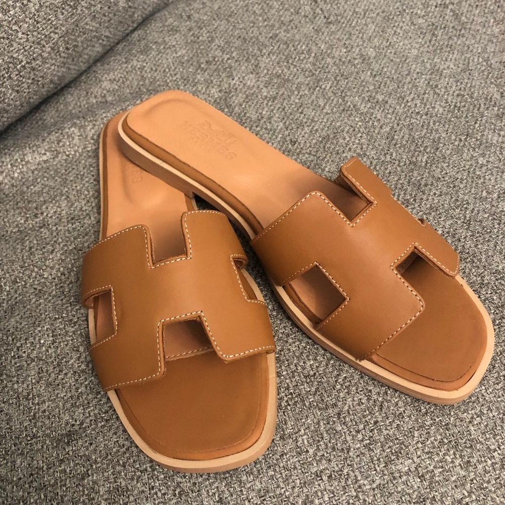 Brand new leather sandals size 38!  Tan color beautiful leather shoes.